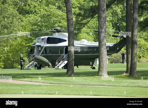 Marine One Presidential Helicopter Sitting On Golf Course In