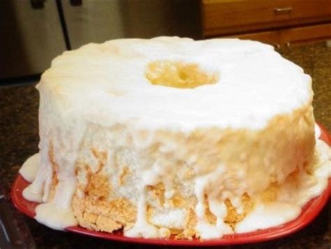 It's pristine white on the inside with a chewy light brown crumb around the exterior. Angel Food Cake with Creamy Glaze | Tasty Kitchen: A Happy ...