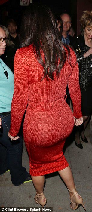 Kim Kardashian Shows Off Curvaceous Derriere In Figure Hugging Skirt