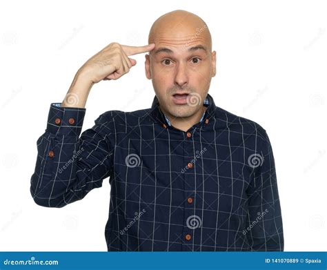 Surprised Man Holds His Finger Near Temple Stock Image Image Of Handsome Bald 141070889
