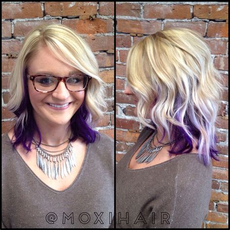 Simply add some purple peek a boo highlights to the bottom layer of your hair, and you'll be receiving compliments for your daring new look all day long. Blonde highlights and purple peekaboo underneath with ...