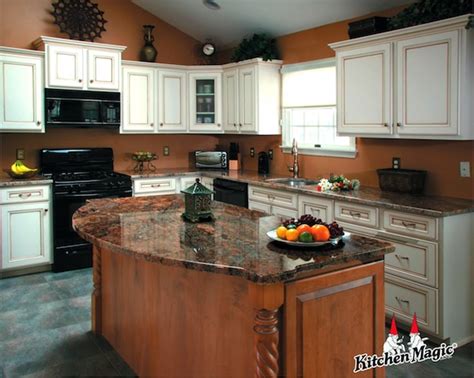 Rescuing your kitchen has never been so easy! Refaced Kitchen Boasts New Island with Granite Top