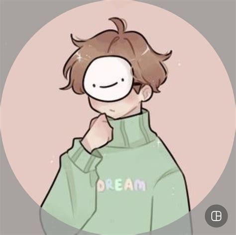 A Person Wearing A Green Sweatshirt With The Words Dream On It In