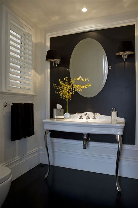 If you decide to add an accent wall to your bathroom take careful consideration of which wall to showcase. Black and white Powder Room - Denai Kulcsar Interiors ...