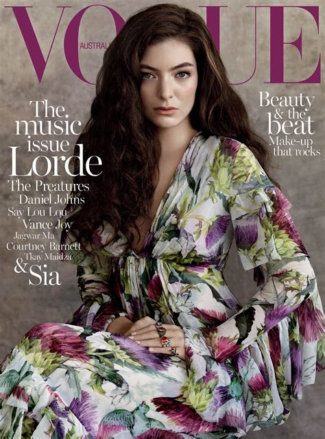 The Front Cover Of A Magazine With An Image Of A Woman Wearing A Floral