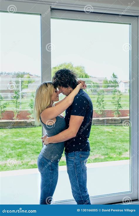 Couple Hugging In The Living Room Stock Image Image Of Alone Indoor