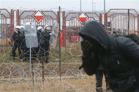 Poles Fire Tear Gas Water Cannon At Migrants On Belarus Border