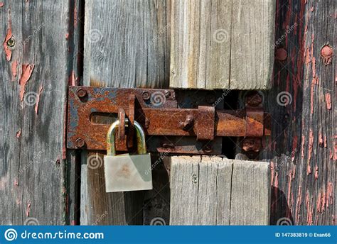 An Old Rusty Padlock On Wooden Barn Door Stock Image Image Of
