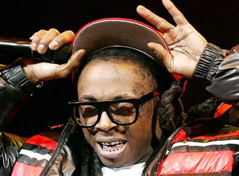 This may be a stupid question but are the little diamond like things on his teeth like glued. Lil Wayne sentencing delayed so rapper can get his teeth ...