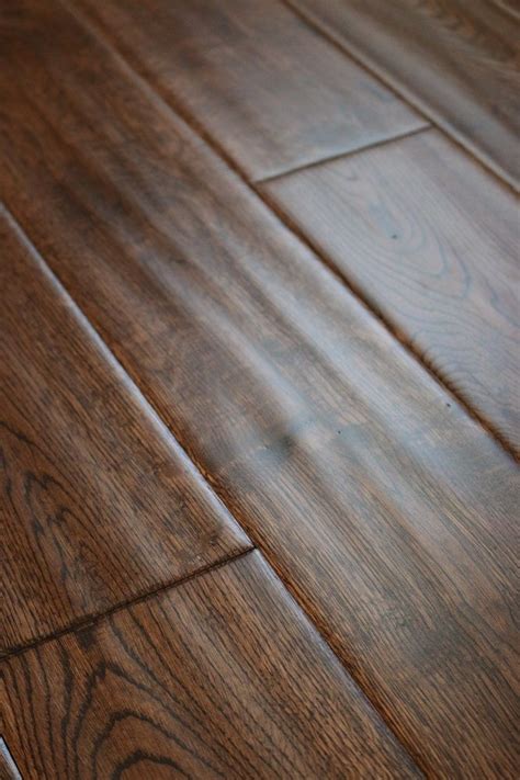 A Close Up View Of A Wood Floor That Has Been Cleaned And Is Brown In Color