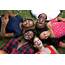 Group Of Friends Lying On The Grass Laughing  Stock Photo Dissolve