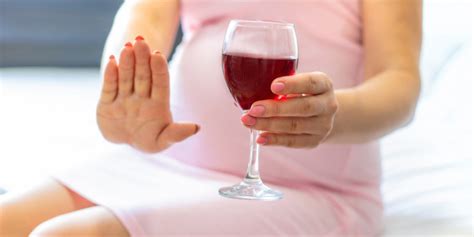 Premium Photo Pregnant Woman Holding A Glass Of Wine