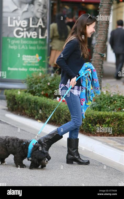 Miranda Cosgrove Seen Shopping At The Grove With Her Pet Dog Featuring