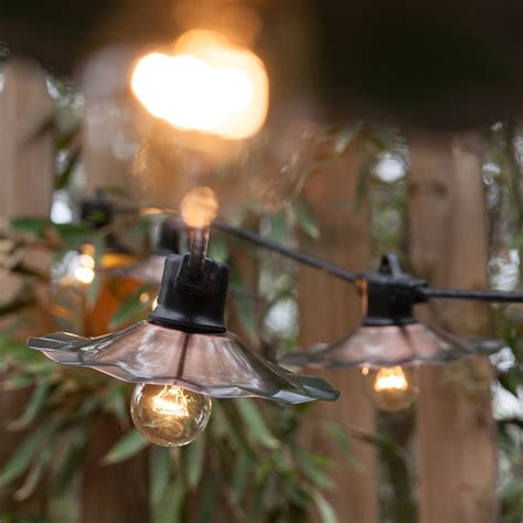 Create A Backyard Cafe With Bistro Lights Yard Envy