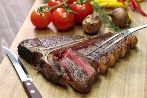 Once the oil is hot, gently put the steak in the pan. How Do I Pan-Fry a Porterhouse Steak? | Steak, Tuscan ...