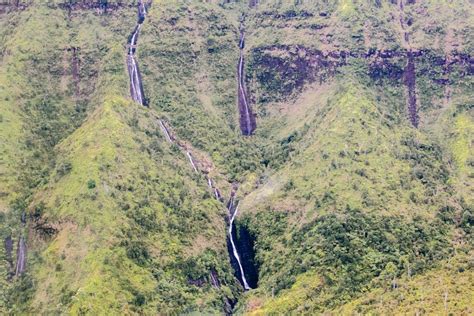 Waterfall View From A Kauai Helicopter Tour Flight Offers Waimea