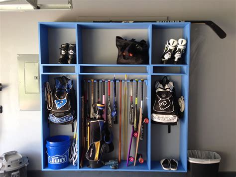 Sports Equipment Lockers In Garage Made From 1x12 And Hung Using