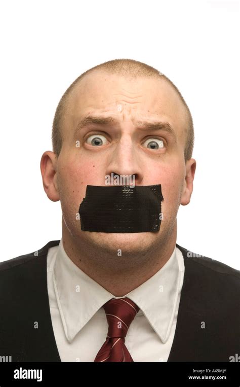 Young Man With His Mouth Covered In Masking Tape Stock Photo Alamy