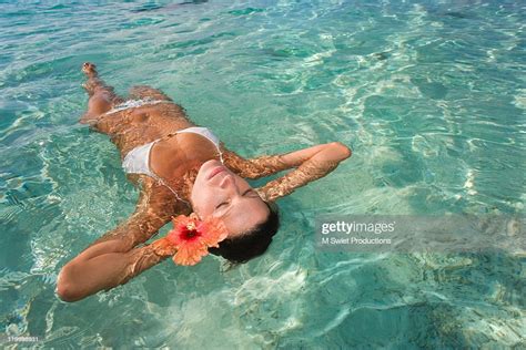 Woman Floating In Water Photo Getty Images