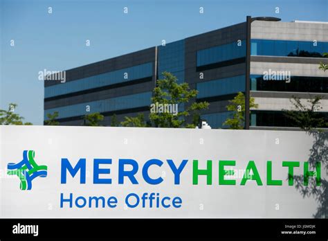 A Logo Sign Outside Of The Headquarters Of Mercy Health In Cincinnati