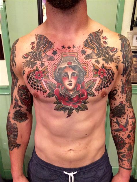 Traditional Chest Piece By Aaron Hodges Spider Murphys Tattoo In San Rafael Ca Arms Als