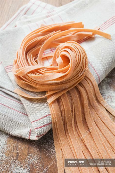 Red Ribbon Pasta On Napkin — Nutrition Indoors Stock Photo 149968902