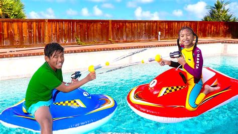 Wendy And Michael Playing With Inflatable Boat Swimming Pool Toy For