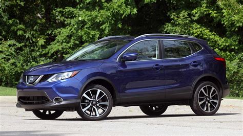 Putting it in sport mode noticeably livens up the throttle response, though remember, this is not a. 2019 Nissan Rogue Sport SL AWD Review: Middle Child Syndrome