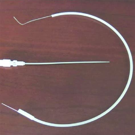 5 French Catheter Above With Internal Dilator Removed Below The