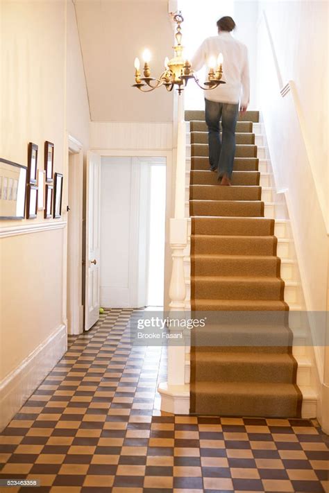 Man Walking Up Staircase High Res Stock Photo Getty Images