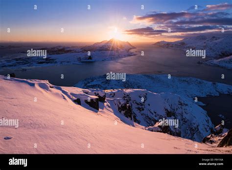Low Winter Sun In January Over Coastal Mountain Landscape From