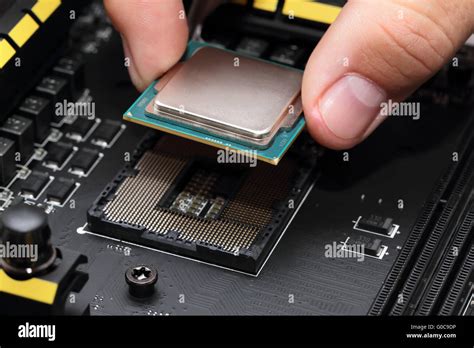 Installing Central Processor Unit Into Motherboard Stock Photo Alamy