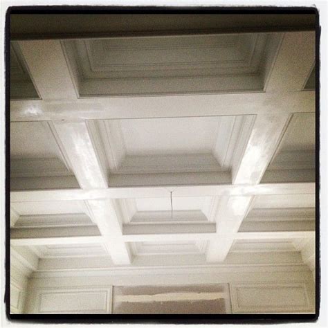 While hard to execute (at least in situ) a decorated ceiling has the advantage that it is largely protected from damage by fingers and dust. "First coat of paint on the coffered ceiling this morning ...