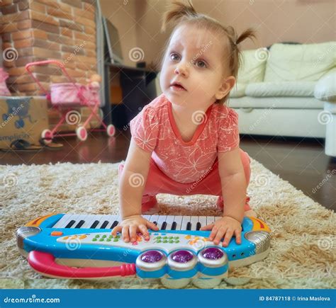 Cute Baby Playing With Toy Piano Stock Photo Image Of Music Cute