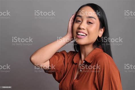 Studio Portrait Of A Young Filipino Woman Stock Photo Download Image