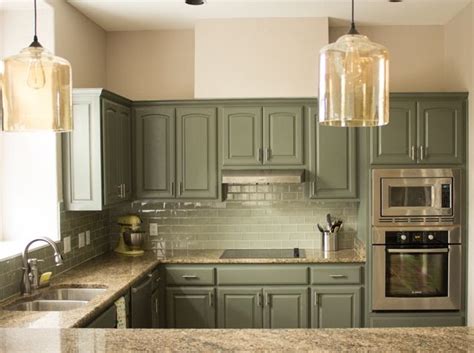 Creamy walls with white shelving will help to lighten up a small kitchen, and placing white wall tiles above the worktops will add a hint of vintage. Sage Green Kitchen Paint Colors With Maple Cabinets - The ...