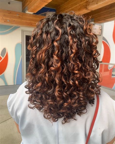 Dark Red Curly Hair With Highlights