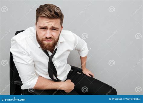 Close Up Portrait Of A Young Frowning Man Stock Photo Image Of