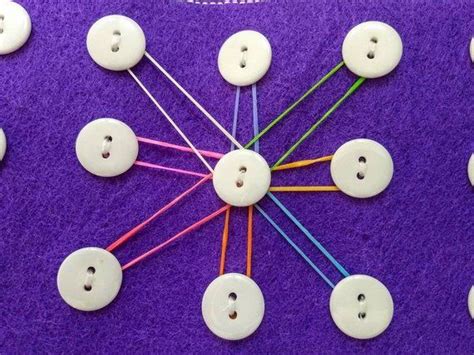 Montessori button game! Stretch and stretch the rubber ...