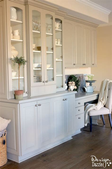 Make sure to adorn your hutch with accented drawer pulls to break the monotony of the solid color. China Cabinet Makeover - Design Dazzle