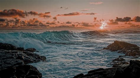 Download Wallpaper 2560x1440 Sea Waves Rocks Coast Sunset