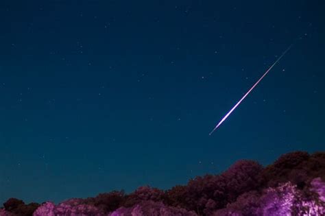 > a perseid meteor streaks over sandstone cliffs at the world heritage site of meteora in greece. Perseid meteor shower 2020: NASA says look up for the best ...