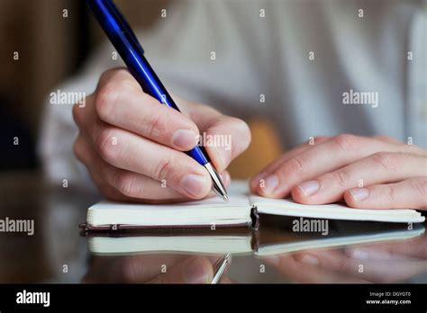 Business Man Write In The Notepad Stock Photo Alamy