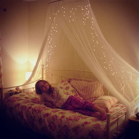 Megans New Vintage Daybed With Floral Bedding And Fairy Light Canopy