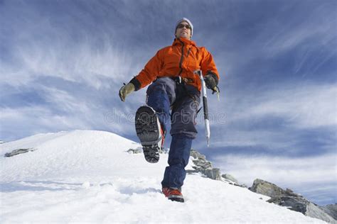 Mountain Climber Hiking On Snowy Slope Stock Image Image Of Adventure