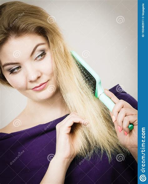 Woman Brushing Her Long Hair With Brush Stock Image Image Of Healthy