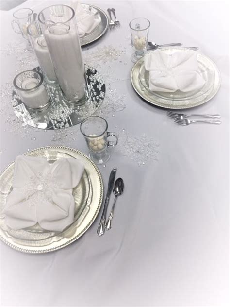 Silver And White Table Setting Is Great For Any Winter Party