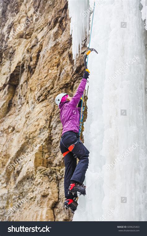 Young Female Climber Climbing Frozen Waterfall Stock Photo Edit Now