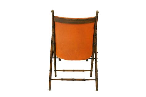 Get the best deals on portable camping chairs. Continental Oak, Brass, and Faux Leather Folding Campaign ...