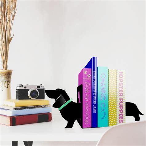 Maybe you would like to learn more about one of these? Serre-livres original en forme de teckel noir en métal sur ...